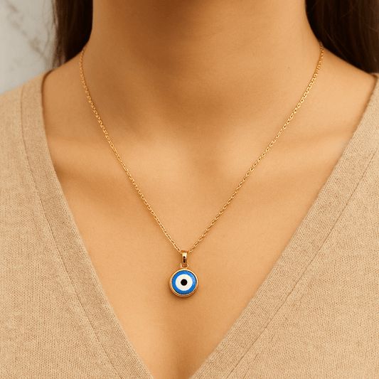 Pendentif porte-bonheur mauvais oeil en acier inoxydable plaqué or. Chaîne réglable 40 + 5 cm, durable & hypoallergénique